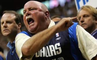 DALLAS - JUNE 20:  Dallas Mavericks fan Hal Browning yells from the front row during game six of the 2006 NBA Finals against the Miami Heat on June 20, 2006 at American Airlines Center in Dallas, Texas.  NOTE TO USER: User expressly acknowledges and agrees that, by downloading and or using this photograph, User is consenting to the terms and conditions of the Getty Images License Agreement.  (Photo by Stephen Dunn/Getty Images)