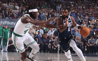 DALLAS, TX - JUNE 14: Kyrie Irving #11 of the Dallas Mavericks drives to the basket during the game against the Boston Celtics during Game 4 of the 2024 NBA Finals on June 14, 2024 at the American Airlines Center in Dallas, Texas. NOTE TO USER: User expressly acknowledges and agrees that, by downloading and or using this photograph, User is consenting to the terms and conditions of the Getty Images License Agreement. Mandatory Copyright Notice: Copyright 2024 NBAE (Photo by Nathaniel S. Butler/NBAE via Getty Images)