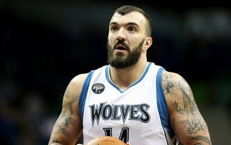 MINNEAPOLIS, MN - JANUARY 17: Nikola Pekovic #14 of the Minnesota Timberwolves shoots a free throw during the game against the Phoenix Suns on January 17, 2016 at Target Center in Minneapolis, Minnesota. NOTE TO USER: User expressly acknowledges and agrees that, by downloading and or using this Photograph, user is consenting to the terms and conditions of the Getty Images License Agreement. Mandatory Copyright Notice: Copyright 2016 NBAE (Photo by Jordan Johnson/NBAE via Getty Images)