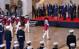 The US Army Old Guard Fife and Drum Corps parade in front of President Donald Trump during Inauguration ceremonies in Emancipation Hall at the US Capitol in Washington, DC, January 20, 2025. (Photo by BONNIE CASH / POOL / AFP)