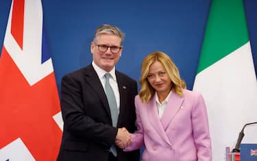 Italian Prime Minister Giorgia Meloni (R) and British Prime Minister Keir Starmer during a press conference at the end of their meeting at Villa Doria Pamphilj in Rome, Italy, 16 September 2024. The two leaders' talks are expected to focus on tackling irregular migration. ANSA/FABIO FRUSTACI
