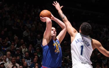 MINNEAPOLIS, MN -  MARCH 19: Nikola Jokic #15 of the Denver Nuggets shoots the ball during the game against the Minnesota Timberwolves on March 19, 2024 at Target Center in Minneapolis, Minnesota. NOTE TO USER: User expressly acknowledges and agrees that, by downloading and or using this Photograph, user is consenting to the terms and conditions of the Getty Images License Agreement. Mandatory Copyright Notice: Copyright 2024 NBAE (Photo by David Sherman/NBAE via Getty Images)