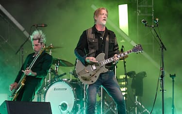 BOSTON, MASSACHUSETTS - MAY 28: (L-R) Michael Shuman & Josh Homme perform with Queens of the Stone Age during Boston Calling Music Festival at Harvard Athletic Complex on May 28, 2023 in Boston, Massachusetts. (Photo by Astrida Valigorsky/Getty Images)