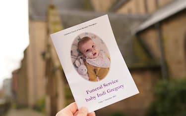 The order of service for the funeral of baby Indi Gregory, is held outside St Barnabus Cathedral, Nottingham. The baby girl died shortly after her life-support treatment was withdrawn after her parents, Mr Gregory and Claire Staniforth who are both in their 30s and from Ilkeston, Derbyshire, lost legal bids in the High Court and Court of Appeal in London for specialists to keep treating her. Picture date: Friday December 1, 2023.