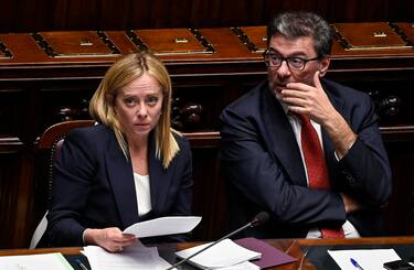 Italian Prime Minister, Giorgia Meloni (L), with Italian Minister of Economy, Giancarlo Giorgetti (R), ahead of a confidence vote for the new government, at the Chamber of Deputies, the lower house of parliament, in Rome, Italy, 25 October 2022. ANSA/RICCARDO ANTIMIANI