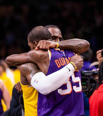 LOS ANGELES, CA - OCTOBER 26: LeBron James #23 of the Los Angeles Lakers embraces Kevin Durant #35 of the Phoenix Suns after the game on October 26, 2023 at Crypto.Com Arena in Los Angeles, California. NOTE TO USER: User expressly acknowledges and agrees that, by downloading and/or using this Photograph, user is consenting to the terms and conditions of the Getty Images License Agreement. Mandatory Copyright Notice: Copyright 2023 NBAE (Photo by Andrew D. Bernstein/NBAE via Getty Images)