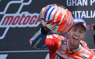 Ducati team Italian rider Andrea Dovizioso celebrates on the podium after winning the MotoGP Italian Grand Prix at the Mugello circuit in Scarperia, central Italy, 04 June 2017.  
ANSA/LUCA ZENNARO