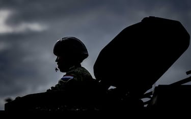epa11229625 A soldier drives a vehicle during the final preparations of the Dutch Army for their contribution to the NATO exercise 'Steadfast Defender 2024', in Oirschot, The Netherlands, 19 March 2024. Over 90,000 troops from all 32 NATO Allies, including approximately 4,500 soldiers from the Dutch Army, will be deployed in the large-scale NATO maneuver 'Steadfast Defender 2024', taking place from January to May 2024.  EPA/REMKO DE WAAL