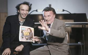 Italian actor and director Roberto Benigni taking part in the TV show Superclassifica Show with Italian TV host and author Maurizio Seymandi. 1991