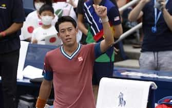 epa09439136 Kei Nishikori of Japan reacts after defeating Salvatore Caruso of Italy during their match on the second day of the US Open Tennis Championships the USTA National Tennis Center in Flushing Meadows, New York, USA, 31 August 2021. The US Open runs from 30 August through 12 September.  EPA/JASON SZENES *** Local Caption *** 56335951