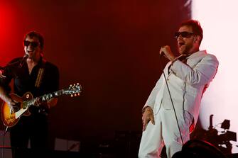 INDIO, CALIFORNIA - APRIL 20: (FOR EDITORIAL USE ONLY) (L-R) Graham Coxon and Damon Albarn of Blur perform at the Coachella Stage during the 2024 Coachella Valley Music and Arts Festival at Empire Polo Club on April 20, 2024 in Indio, California. (Photo by Frazer Harrison/Getty Images for Coachella)