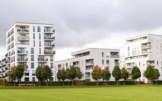 Cityscape with modern apartment buildings in a residential area in late autumn