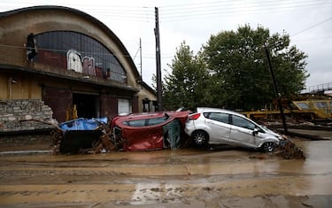epa10843212 Damaged cars are seen during the storm named Daniel in the area of Volos, Magnesia, Greece, 06 September 2023. The storm 'Daniel' sweeping through most of Greece with heavy rain and lightning caused extensive damage in the power network at Volos, Mt. Pilio, elsewhere in the Magnissia prefecture, as well as in the Sporades Islands.  EPA/YANNIS KOLESIDIS