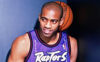 TORONTO, CANADA - 1999: Vince Carter #15 of the Toronto Raptors poses for a portrait during a behind the scenes shoot circa 1999 at the Air Canada Centre in Toronto, Canada. NOTE TO USER: User expressly acknowledges and agrees that, by downloading and or using this photograph, User is consenting to the terms and conditions of the Getty Images License Agreement. Mandatory Copyright Notice: Copyright 1999 NBAE  (Photo by Fernando Medina/NBAE via Getty Images)