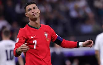 epa11451092 Cristiano Ronaldo gestures during the UEFA EURO 2024 Round of 16 soccer match between Portugal and Slovenia, in Frankfurt Main, Germany, 01 July 2024.  EPA/OLIVIER MATTHYS