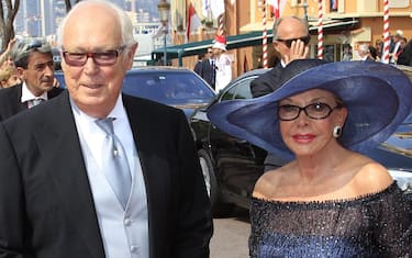 epa02807297 Prince Vittorio Emanuele (L), Duke of Savoia, and his wife Marina Doria arrive for the wedding mass of Prince Albert II of Monaco and Princess Charlene in the Main Courtyard of the Prince's Palace in Monaco, 02 July 2011. Some 850 guests will attend the mass in the Main Courtyard. The ceremony will be broadcasted on giant screens in the Palace Square for about 3,500 Monegasques.  EPA/JEAN-PAUL PELISSIER / POOL