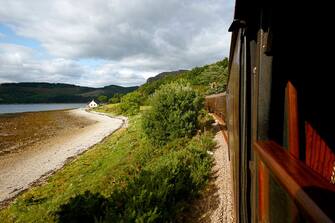 Tourism in Scotland, landscape of Loch Duich, view from the Scottish tourist palace train "Royal Scotsman" (Photo by: Andia/Universal Images Group via Getty Images)