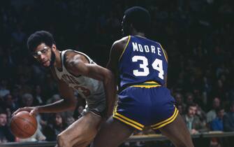 MILWAUKEE, WI - CIRCA 1974:  Kareem Abdul-Jabbar #33 of the Milwaukee Bucks dribbles the ball backing in on Otto Moore #34 of the New Orleans Jazz during an NBA basketball game circa 1974 at the Milwaukee Arena in Milwaukee, Wisconsin. Abdul-Jabbar played for the Bucks from 1969 - 75. (Photo by Focus on Sport/Getty Images) *** Local Caption *** Kareem Abdul-Jabbar; Otto Moore