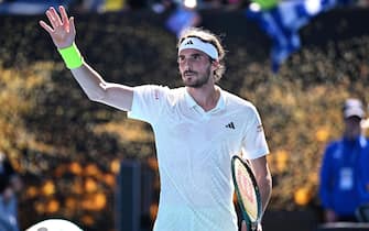 epa11078642 Stefanos Tsitsipas of Greece celebrates after winning his first round match against Zizou Bergs of Belgium on Day 2 of the 2024 Australian Open at Melbourne Park in Melbourne, Australia, 15 January 2024.  EPA/JOEL CARRETT AUSTRALIA AND NEW ZEALAND OUT