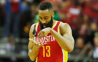 HOUSTON, TX - MARCH 19:   James Harden #13 of the Houston Rockets battles for a rebound with Wilson Chandler #21 of the Denver Nuggets during their game at the Toyota Center on March 19, 2015 in Houston, Texas. NOTE TO USER: User expressly acknowledges and agrees that, by downloading and/or using this photograph, user is consenting to the terms and conditions of the Getty Images License Agreement. (Photo by Scott Halleran/Getty Images) *** Local Caption *** James Harden; Wilson Chandler