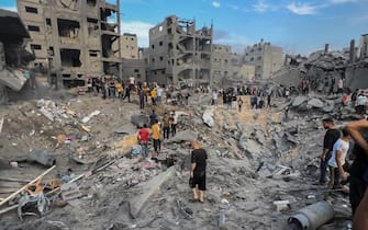 31 October 2023, Palestinian Territories, Jabalia: A screen grab from a video shows Palestinians searching for survivors following an Israeli airstrike in the Jabalia refugee camp north of Gaza City. (Best Quality Available) Photo: Fadi Wael Alwhidi/dpa (Photo by Fadi Wael Alwhidi/picture alliance via Getty Images)