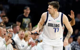 MINNEAPOLIS, MINNESOTA - MAY 30: Luka Doncic #77 of the Dallas Mavericks reacts after a basket during the first quarter against the Minnesota Timberwolves in Game Five of the Western Conference Finals at Target Center on May 30, 2024 in Minneapolis, Minnesota. NOTE TO USER: User expressly acknowledges and agrees that, by downloading and or using this photograph, User is consenting to the terms and conditions of the Getty Images License Agreement. (Photo by David Berding/Getty Images)