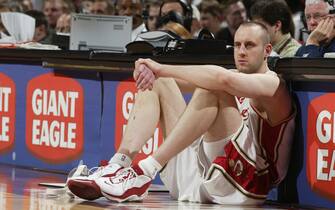 CLEVELAND- APRIL 3:  Zydrunas Ilgauskas #11 of the Cleveland Cavaliers sits on the sideline waiting to enter the game against the Golden State Warriors at Gund Arena on April 3, 2004 in Cleveland, Ohio.  The Warriors won 103-100.  NOTE TO USER: User expressly acknowledges and agrees that, by downloading and/or using this Photograph, User is consenting to the terms and conditions of the Getty Images License Agreement.  (Photo by David Liam Kyle/NBAE via Getty Images)