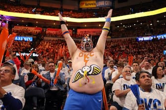 OKLAHOMA CITY, OKLAHOMA - APRIL 24:  An Oklahoma City Thunder fan cheers during game two of the first round of the NBA playoffs against the New Orleans Pelicans at Paycom Center on April 24, 2024 in Oklahoma City, Oklahoma. (Photo by Jamie Squire/Getty Images)