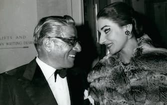 Jun. 06, 1959 - Aristotle Onassis Gives Celebration Parties For Maria Callas's Triumphant Performance Of ''Medea'': Magnificent opera star Maria Callas gave a triumphant performance of ''Medea'' at the Royal Opera House, Covent Garden, last night. Mr. Onassis, the Greek shipping millionaire, gave a two-tiered party, the first at the Opera House, and the second at the Dorchester Hotel, to celebrate the occasion. Photo shows Mr. Onassis is seen in conversation with Maria Callas during the party at the Royal Opera House last night after her great triumphant performance.  (Credit Image: © Keystone Press Agency/ZUMA Press Wire)