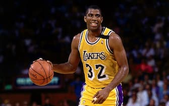 LOS ANGELES - 1989: Magic Johnson #32 of the Los Angeles Lakers moves the ball upcourt during an NBA game at the Forum in Los Angeles, California. NOTE TO USER: User expressly acknowledges  and agrees that, by downloading and or using this  photograph, User is consenting to the terms and conditions of the Getty Images License Agreement. (Photo by Andrew D. Bernstein/ NBAE/ Getty Images)
