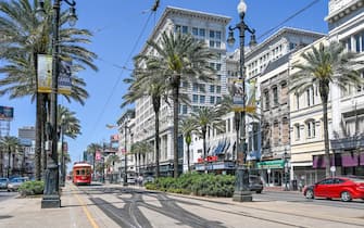 Streetcar on Canal Street in New Orleans. The historic French Quarter is a major tourist attraction.