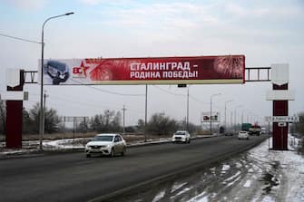 A road sign reading "Stalingrad" sits on the side of a road entering the Russian southern city of Volgograd (former Stalingrad) on January 31, 2023, after authorities temporarily replaced signs as part of celebrations marking the 80th anniversary of the Stalingrad Battle. - The city was renamed Volgograd in 1961, eight years after the death of Soviet dictator Joseph Stalin. (Photo by STRINGER / AFP) (Photo by STRINGER/AFP via Getty Images)