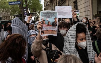 PARIS, FRANCE - MAY 3: Students protest outside Science Po university on May 3, 2024 in Paris, France.  Police in Paris entered the Sciences Po University today removing student pro-Palestine activists who had staged a sit-in in buildings overnight. (Photo by Natalia Campos/Getty Images)
