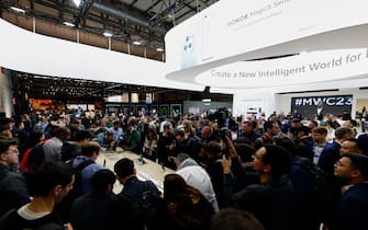 BARCELONA, SPAIN - FEBRUARY 27: Guests view the newest Honor smartphone, Honor Magic5 Pro, during its presentation on day 1 of Mobile World Congress 2023 at Fira Barcelona on February 27, 2023 in Barcelona, Spain. (Photo by Joan Cros Garcia - Corbis/Getty Images)