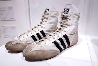 The Adidas high top size 8.5 sneakers belonging to British singer-songwriter Freddie Mercury are displayed during the media preview for "Freddie Mercury: A World of His Own: The Evening Sale" at Sotheby's in New York City on June 1, 2023. More than 1,500 items from Mercury's private collection, including costumes and unique objects as well as the draft lyrics, will feature in the eventual auctions on September 6-8 in London and online August 4-September 11. The auction is expected to fetch at least Â£6 million ($7.5 million). (Photo by TIMOTHY A. CLARY / AFP) (Photo by TIMOTHY A. CLARY/AFP via Getty Images)