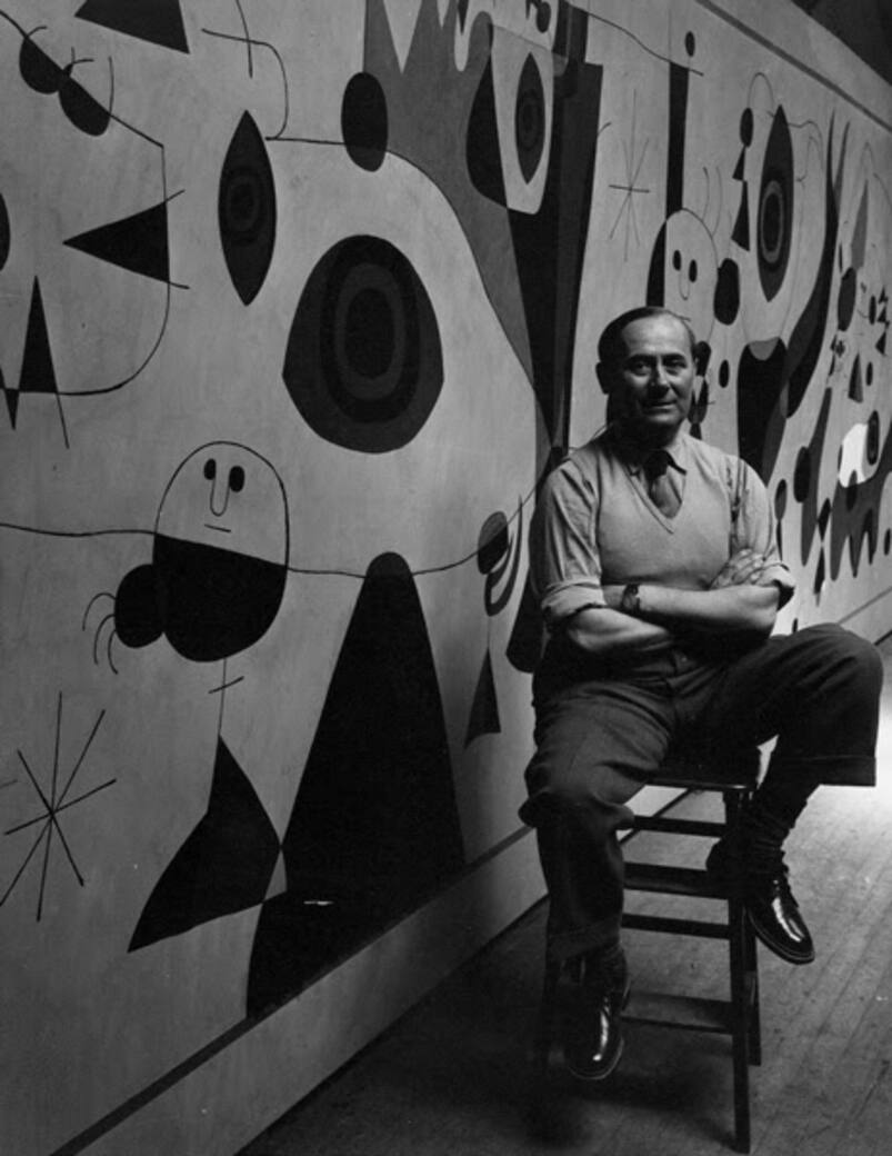 Joan Miró in Carl Holty's studio, in front of the mural painting for the Terrace Plaza Hotel in Cincinnati. Photo: Arnold Newman © Arnold Newman / Getty Images