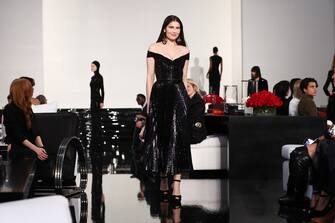 NEW YORK, NEW YORK - MARCH 22: Model Laetitia Casta walks the runway at the Ralph Lauren Fall 2022 Fashion Show at the Museum of Modern Art on March 22, 2022 in New York City. (Photo by Arturo Holmes/Getty Images)