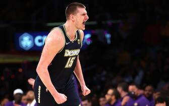 LOS ANGELES, CALIFORNIA - APRIL 03: Nikola Jokic #15 of the Denver Nuggets reacts after scoring  during the second half of a game against the Denver Nuggets at Crypto.com Arena on April 03, 2022 in Los Angeles, California. NOTE TO USER: User expressly acknowledges and agrees that, by downloading and/or using this Photograph, user is consenting to the terms and conditions of the Getty Images License Agreement. Mandatory Copyright Notice: Copyright 2022 NBAE (Photo by Sean M. Haffey/Getty Images)