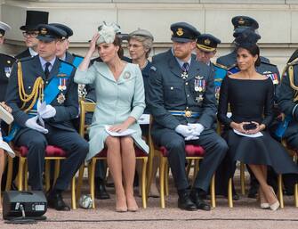 (left to right) The Duke of Cambridge., Duchess of Cambridge, Duke of Sussex and Duchess of Sussex attend the presentation of a new Queen's Colour to the Royal Air Force at a ceremony to mark its centenary, on the forecourt of Buckingham Palace, London.