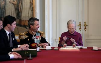 epa11076138 Denmark's Queen Margrethe (R) signs a declaration of abdication next to Crown Prince Frederik (C) and Prince Christian in the Council of State at Christiansborg Castle in Copenhagen, Denmark, 14 January 2024. Denmark's Queen Margrethe II announced in her New Year's speech on 31 December 2023 that she would abdicate on 14 January 2024, the 52nd anniversary of her accession to the throne. Her eldest son, Crown Prince Frederik, is set to succeed his mother on the Danish throne as King Frederik X. His son, Prince Christian, will become the new Crown Prince of Denmark following his father's coronation.  EPA/MADS CLAUS RASMUSSEN DENMARK OUT