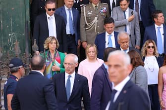 La presidente del Consiglio Giorgia Meloni dopo la visita alla tomba di Giovanni Falcone nella chiesa di  San Domenico a Palermo, 19 luglio 2023.
ANSA/Igor Petyx