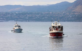 Fire Brigade and Coast Guard units search for the seven missing people who were on board the sailboat that sank at dawn this morning in Palermo, Sicily, Italy, 19 August  2024. A 56-meter-long luxury sailboat, the Bayesian, with 22 people on board, sank at dawn on Monday off Porticello, near Palermo, after a tornado hit the area. At least six missing, one dead in Palermo shipwreck 
ANSA/IGOR PETYX