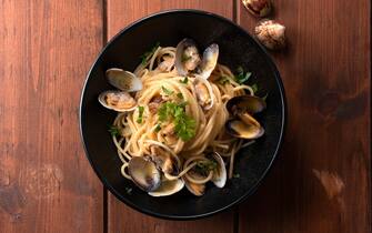 Dish of delicious spaghetti with clams, Italian Cuisine
