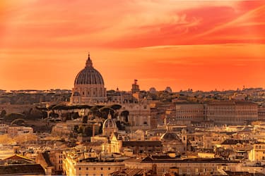 The dome of St Peter's Basilica at sunset ,Rome ,Italy