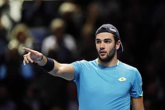 epa07996052 Matteo Berrettini of Italy reacts after winning his round robin match against Dominic Thiem of Austria at the ATP World Tour Finals tennis tournament in London, Britain, 14 November 2019.  EPA/WILL OLIVER