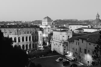 Rome, Italy - Jan 2, 2020: Theater of Marcellus or Teatro di Marcello, Temple of Apollo Sosianus, Church of Santa Maria in Campitelli and synagogue, Rome