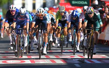 SEVILLE, SPAIN - AUGUST 21: (L-R) Stage winner Pavel Bittner of Czech Republic and Team dsm-Firmenich PostNL and Wout van Aert of Belgium and Team Visma | Lease a Bike - Green Points Jersey sprint at finish line during La Vuelta, 79th Tour of Spain 2024, Stage 5 a 177km stage Fuente del Maestre to Seville / #UCIWT / on August 21, 2024 in Seville, Spain. (Photo by Tim de Waele/Getty Images)