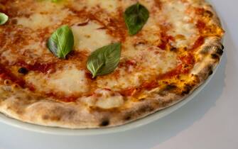 Pizza Margherita with Basil Fior di Latte and Tomato, in the Verace Pizza Napoletana Style