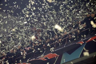 AC Milan fans throw fake dollars during he UEFA Champions League group F soccer match between Ac Milan and Paris Saint-German's at Giuseppe Meazza stadium in Milan, 7 November 2023.
ANSA / MATTEO BAZZI



