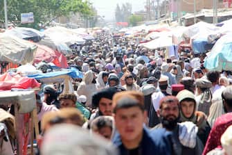 epa11264097 Afghans visits the market ahead of the Muslim festival of Eid al-Fitr in Kandahar, Afghanistan, 07 April 2024. Eid al-Fitr is an Islamic holiday that marks the end of Ramadan, and is celebrated during the first three days of Shawwal, the 10th month of the Islamic calendar. It is expected to begin on 10 or 11 April 2024, depending on the lunar calendar. The Muslims' holy month of Ramadan is the ninth month in the Islamic calendar, and it is believed that the revelation of the first verse in the Koran was during its last ten nights. It is celebrated yearly by praying during the nighttime and abstaining from eating, drinking, and sexual acts during the period between sunrise and sunset.  EPA/QUDRATULLAH RAZWAN